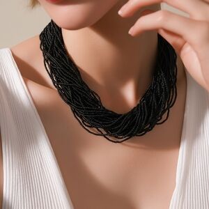 Multi-strand black seeded bead necklace